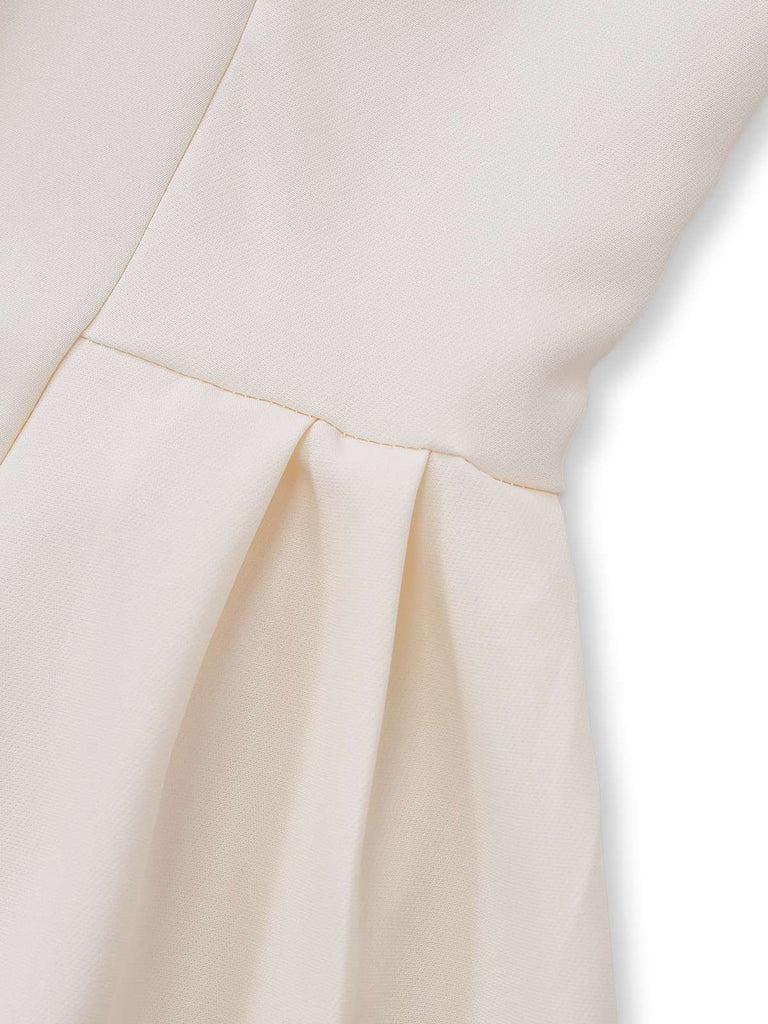 Abito a pieghe con revers doppiopetto beige anni '70