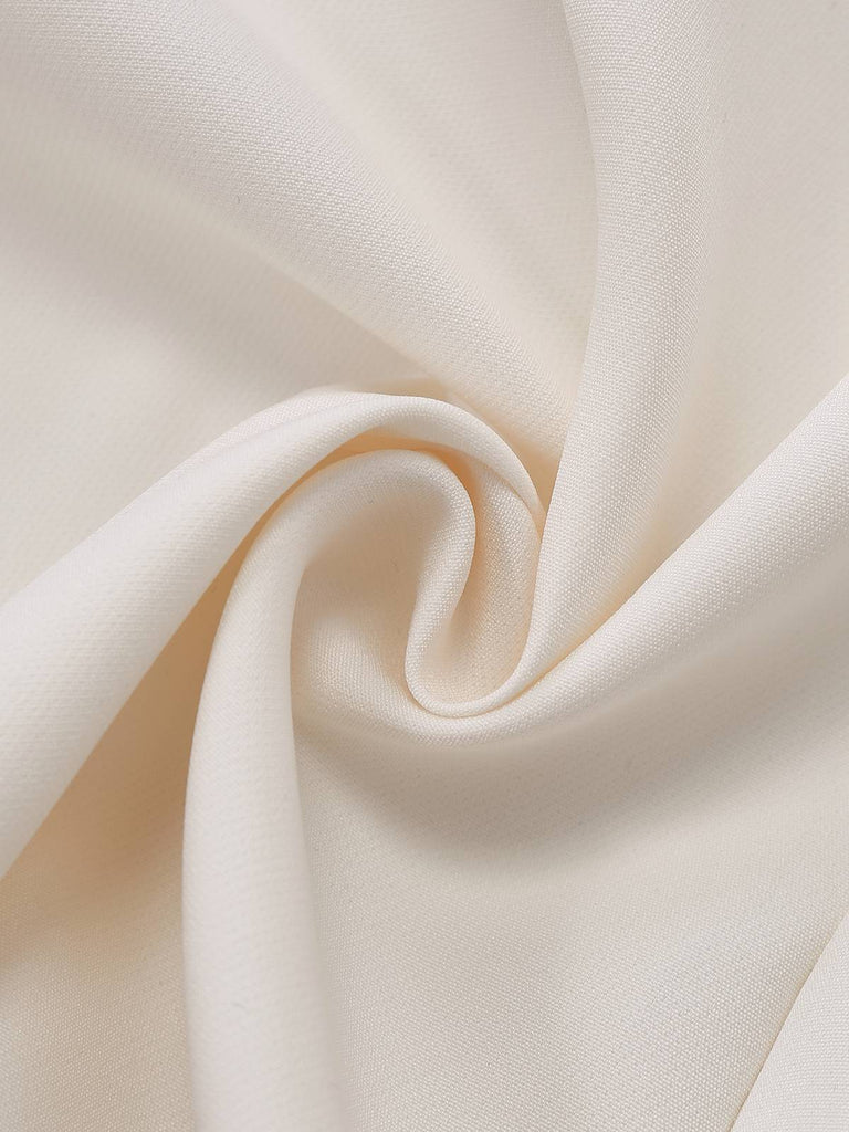 Abito a pieghe con revers doppiopetto beige anni '70