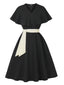 Abito con scollo a V e cintura nero anni '50