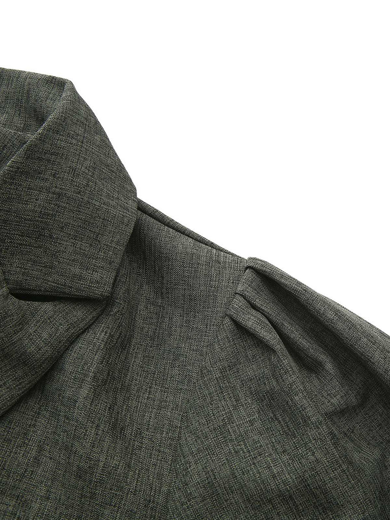 Abito con colletto a punta e maniche a lanterna anni '40