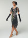 Abito flapper con frange di perline e paillettes a pavone nero anni '20