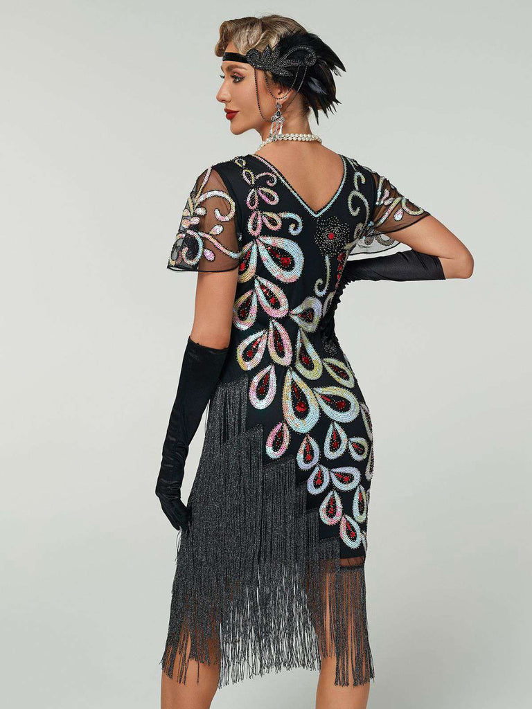 Abito flapper con frange di perline e paillettes a pavone nero anni '20
