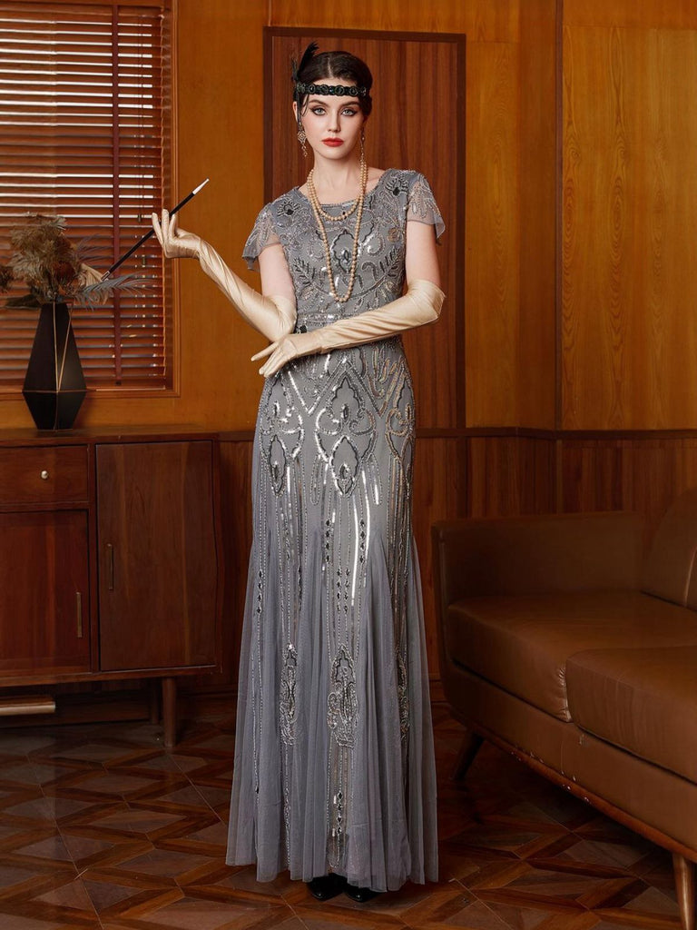 Abito con paillettes e maniche ad aletta in tulle grigio anni '20