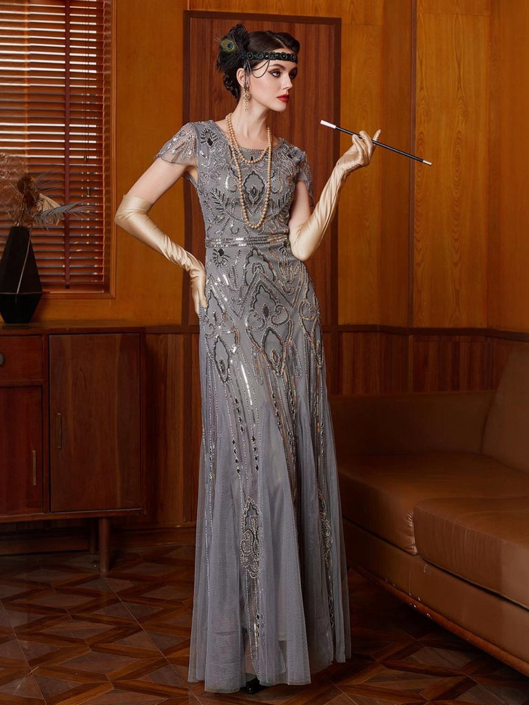 Abito con paillettes e maniche ad aletta in tulle grigio anni '20