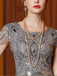 Abito con paillettes e maniche ad aletta in tulle grigio anni '20