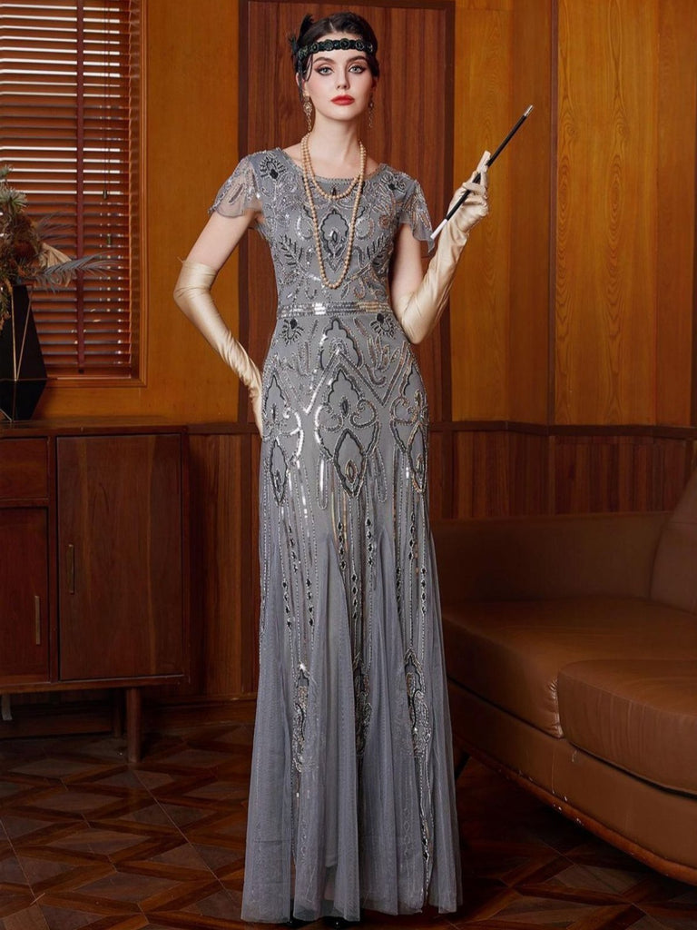 Abito con paillettes e maniche ad aletta in tulle grigio anni '20