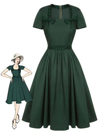 Abito con colletto quadrato e fiocco tinta unita verde anni '50