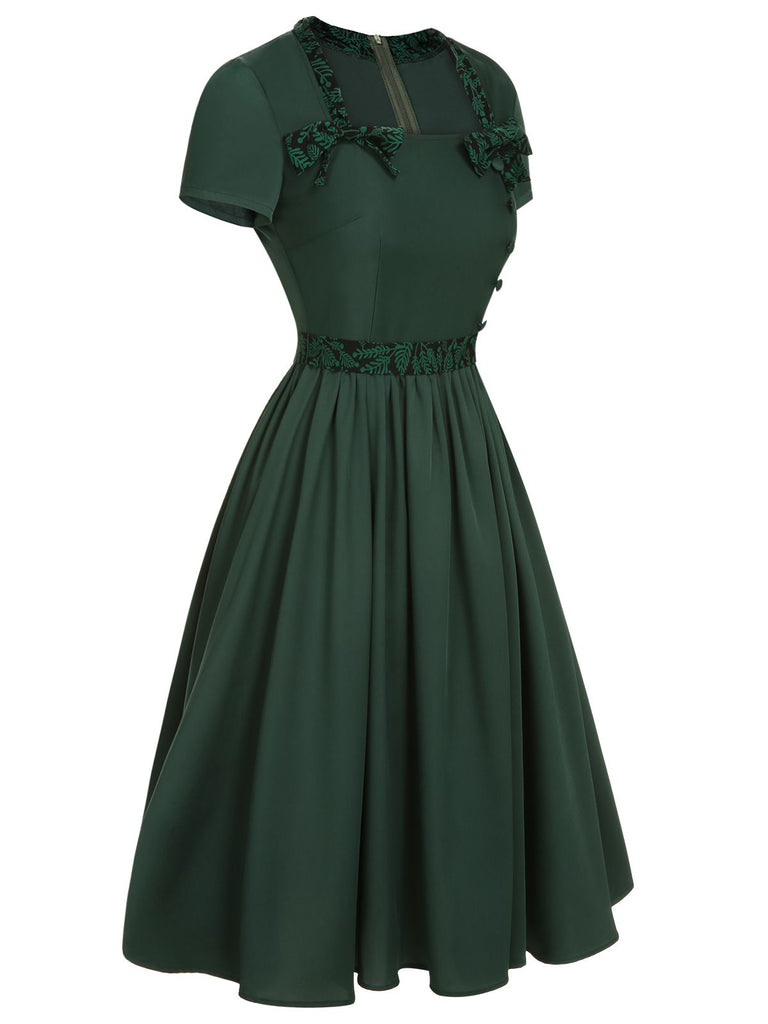 Abito con colletto quadrato e fiocco tinta unita verde anni '50