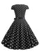 Abito a pois con maniche a cappuccio e cintura anni '50