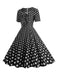 Abito a ruota pois fiocco a cuore nero anni '50