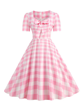 Abito a ruota pois fiocco a cuore rosa pallido anni '50