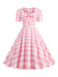 Abito a ruota pois fiocco a cuore rosa pallido anni '50
