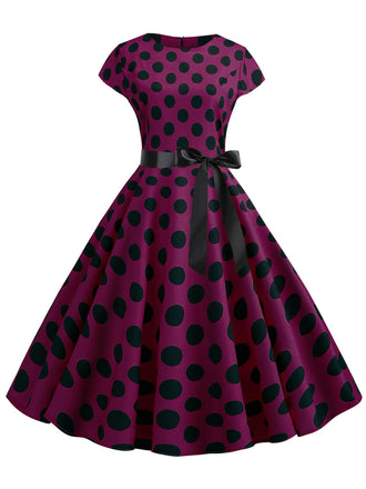 Abito a pois a maniche corte rosso violaceo anni '50