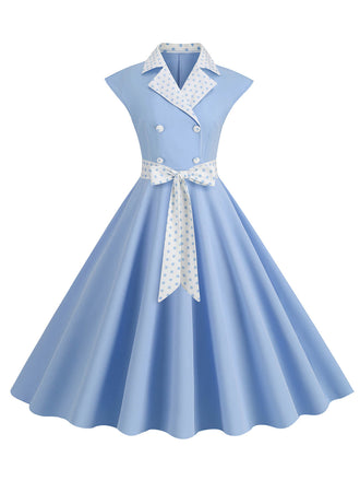 Abito a pois a contrasto con cintura e fiocco cielo azzurro anni '50