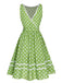 Abito a pois in pizzo con fiocco verde anni '50