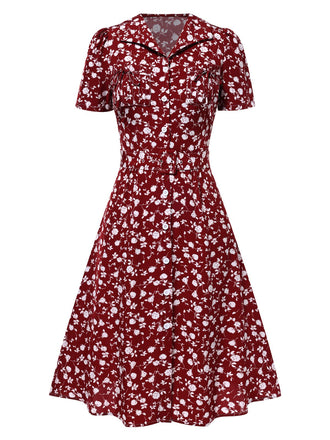 Abito floreale a risvolto bottoni rosso anni '40