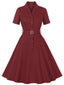 Abito con cintura e revers a tinta unita bordeaux anni '50