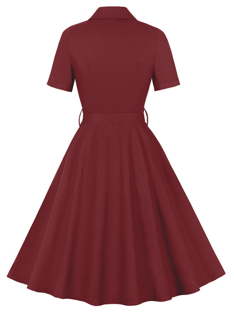Abito con cintura e revers a tinta unita bordeaux anni '50