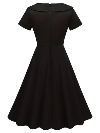 Abito con revers abbottonato nero anni '40