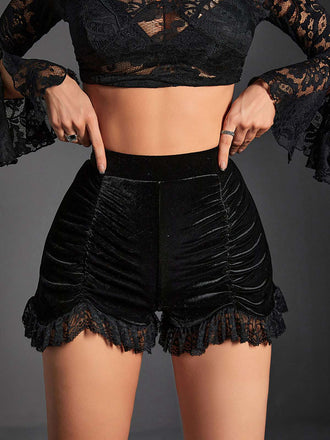 Pantaloncini plissettati in pizzo di velluto nero anni '70