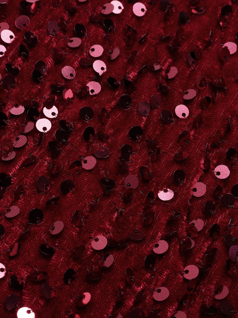 Abito rosso con paillettes e spalle scoperte anni '30
