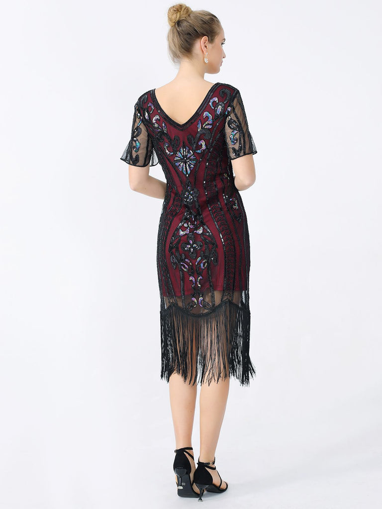 Abito frange paillettes scollo a V anni '20