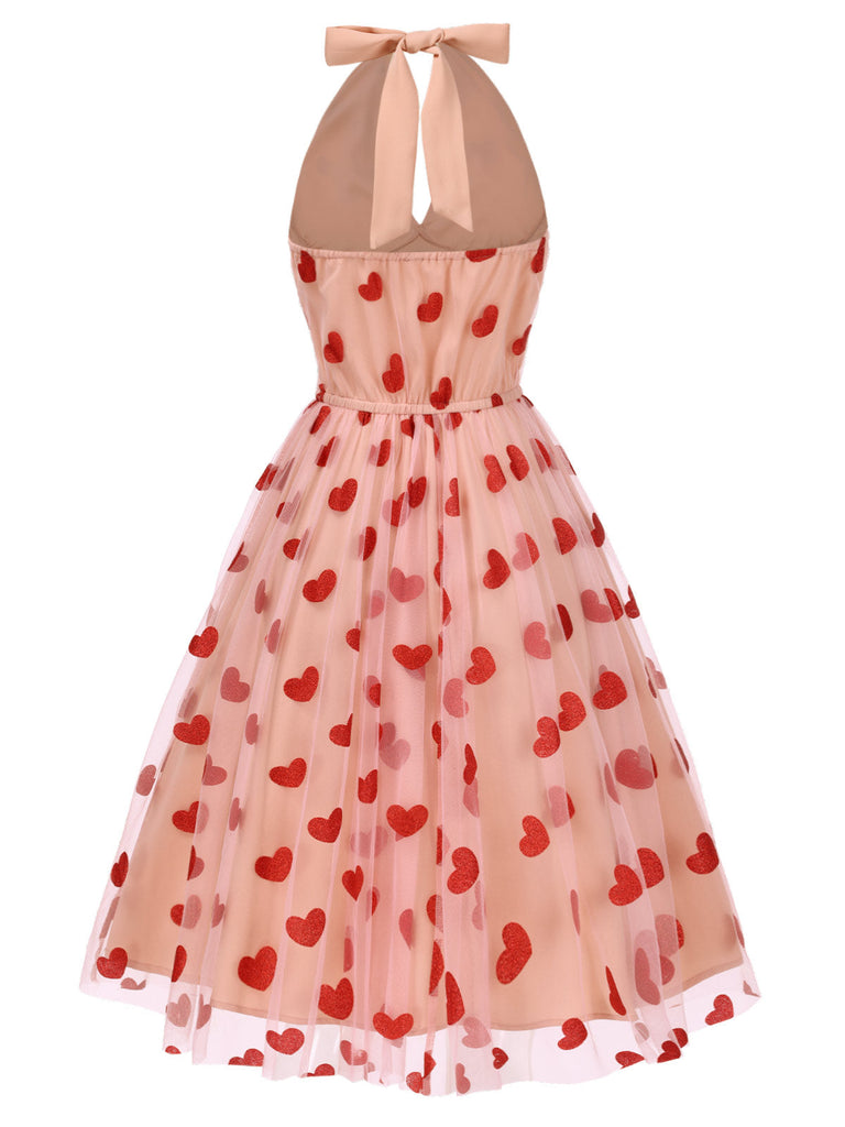 Abito rosa in rete con cuore e scollo all'americana anni '50