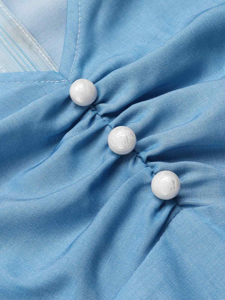 Tuta corta blu anni '40 con volant stile Cenerentola