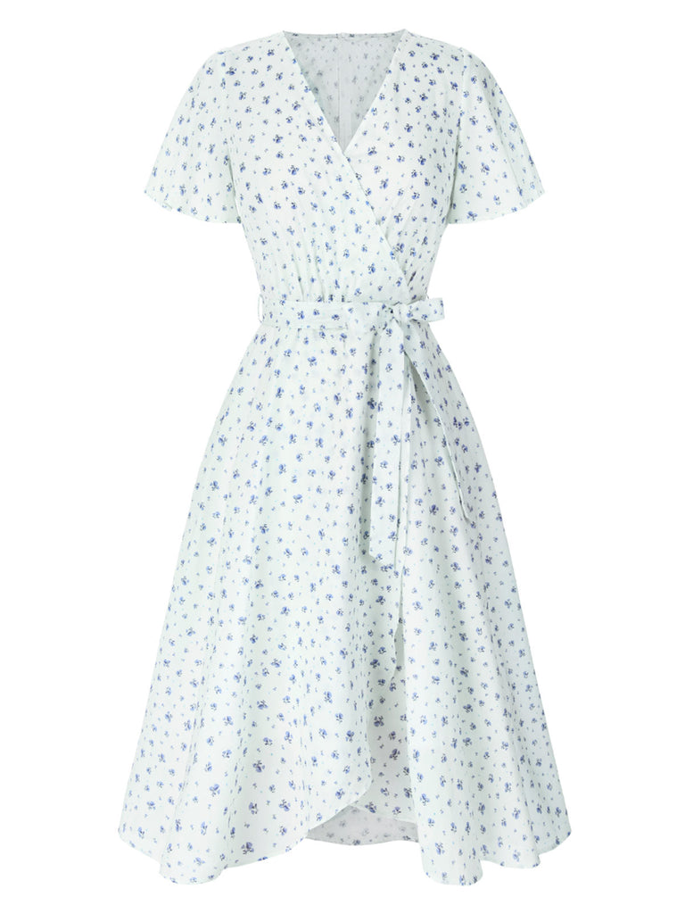Abito floreale con cravatta obliqua in cotone bianco anni '40