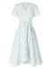 Abito floreale con cravatta obliqua in cotone bianco anni '40