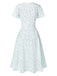 Abito floreale con cravatta obliqua in cotone bianco anni '40