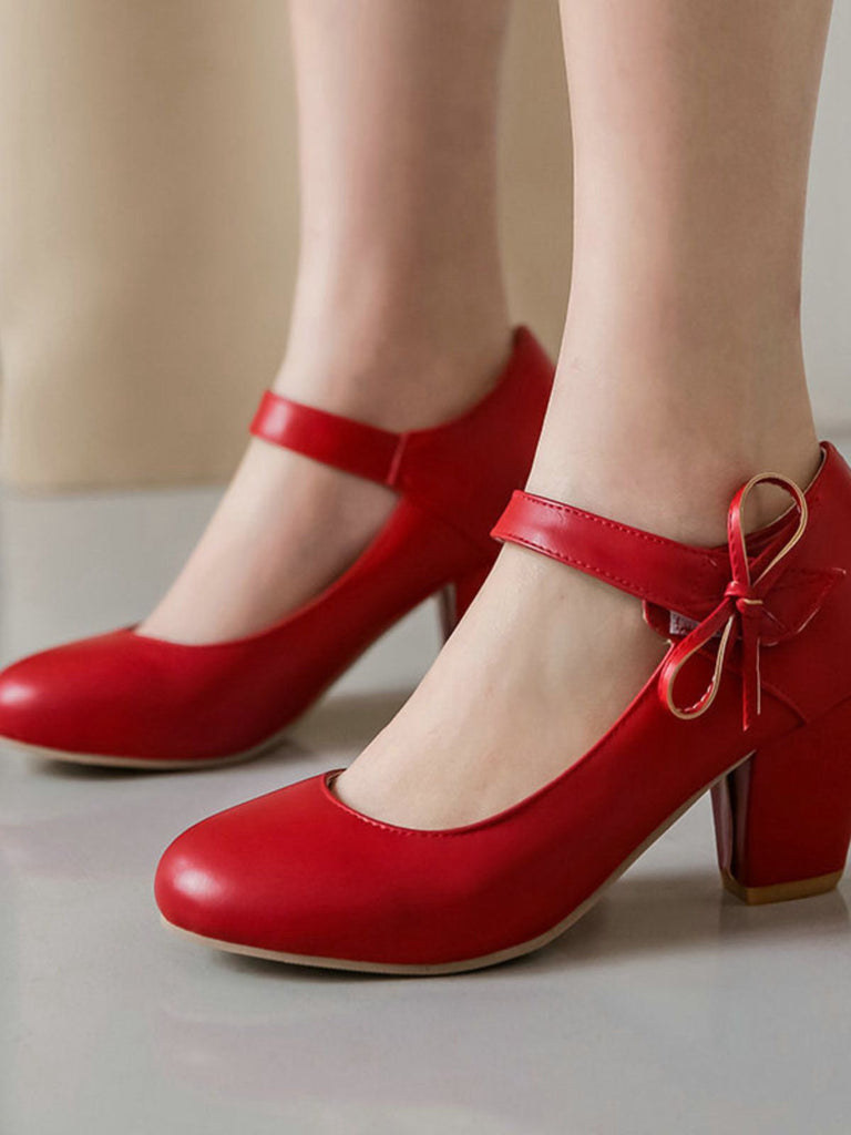 Scarpe con tacco grosso e fiocco punta tonda e tinta unita