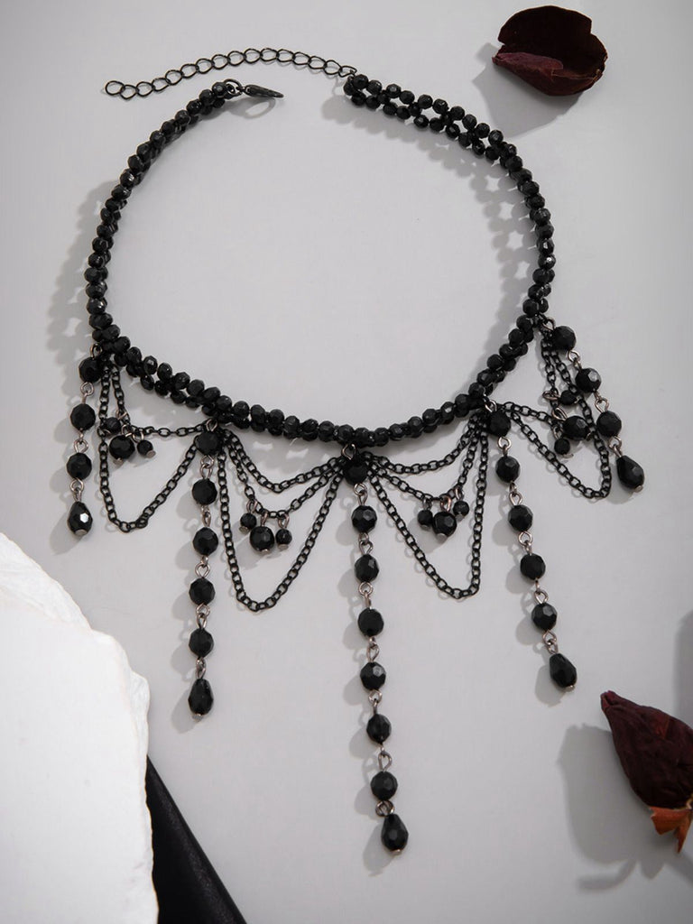 Collana gotico con nappe in cristallo artificiale nero