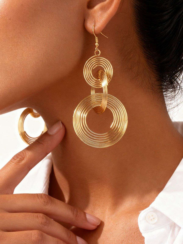 Orecchini vintage in lega a spirale esagerata in oro