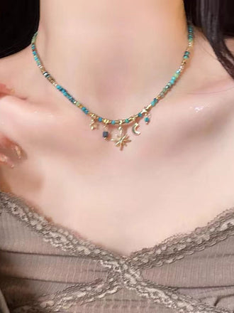 Collana Boho Turchese con Perline e Pendente Sole Luna Stella