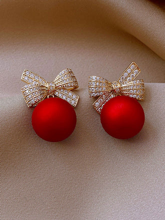 Orecchini con fiocco di Natale rosso e diamanti