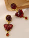 Orecchini in resina a forma di cuore bordeaux