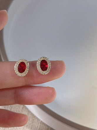 Orecchini vintage con diamanti e cristallo ovale rosso