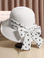 Cappello di paglia bianco con fiocco a pois