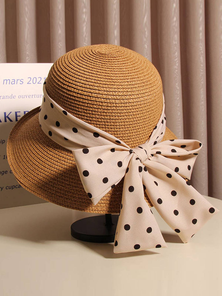Cappello di paglia cachi con fiocco a pois