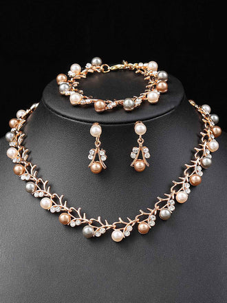 Set di collana e bracciale e orecchini a forma di vite con perle