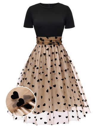 Abito vintage a pois con cuore nero anni '50