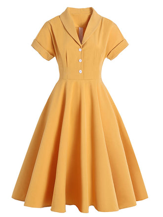 Abito a ruota bottoni giallo anni '50