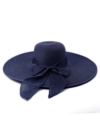 Cappello da sole in rafia a tesa larga con nastro