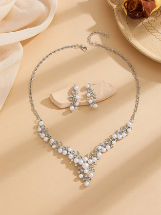 Set di collana e orecchini con foglie di perle bianche e strass
