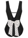 Costumi intero a pois fiocco e scollo a V nero anni '50