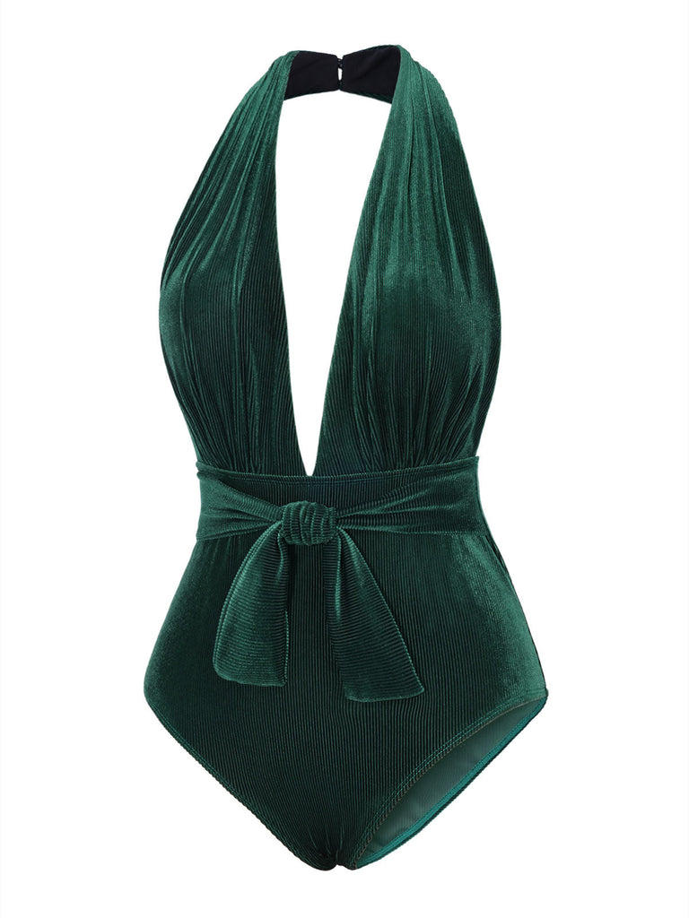 Costumi con scollo a V in velluto verde scuro degli anni '70