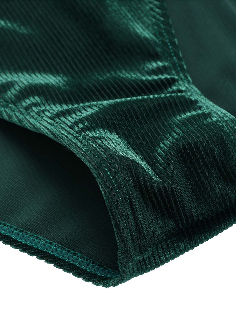 Costumi con scollo a V in velluto verde scuro degli anni '70