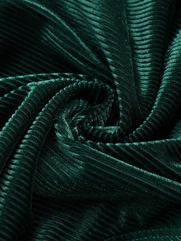 Costumi con scollo a V in velluto verde scuro degli anni '70