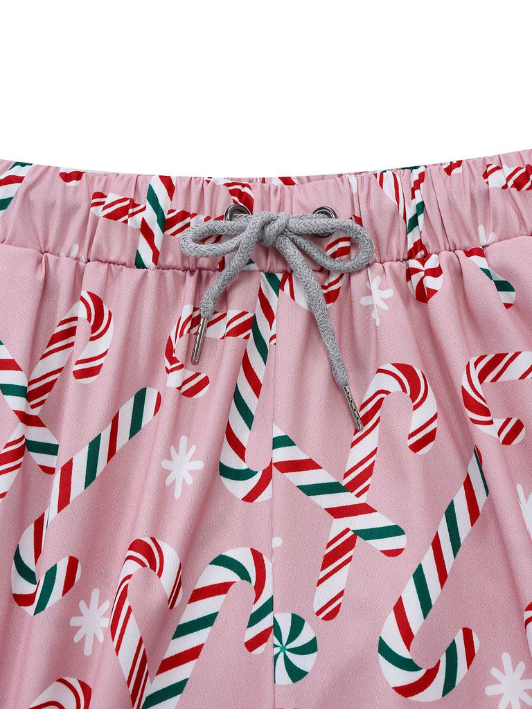 Pigiama lungo a bastoncino di zucchero natalizio rosa anni '40